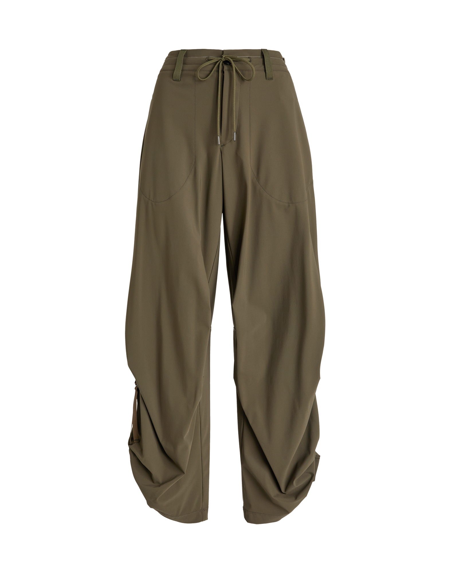 Front view of OUTGOING trousers in olive green with wide fit, adjustable drawstring waist, large side pockets, and gathered hem with D-ring detail on the leg.